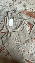Tan and gold zip
