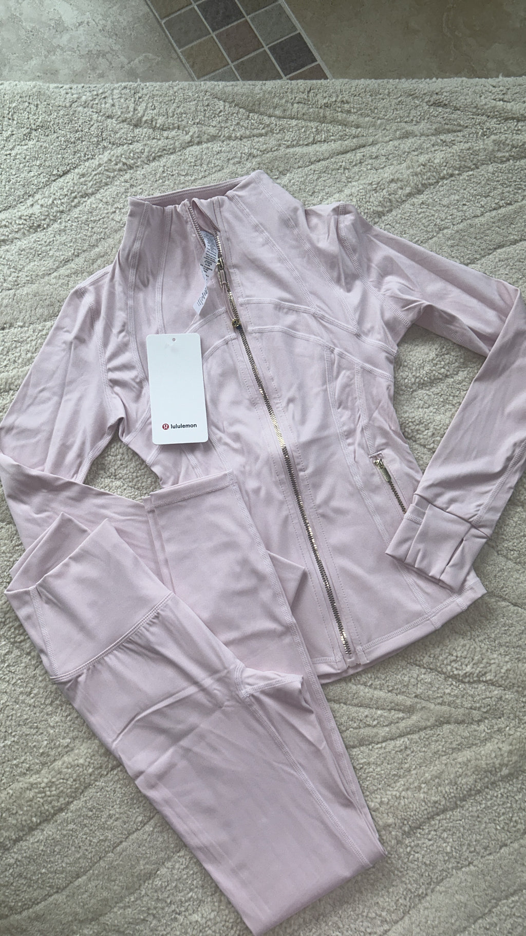 Baby pink and gold zip