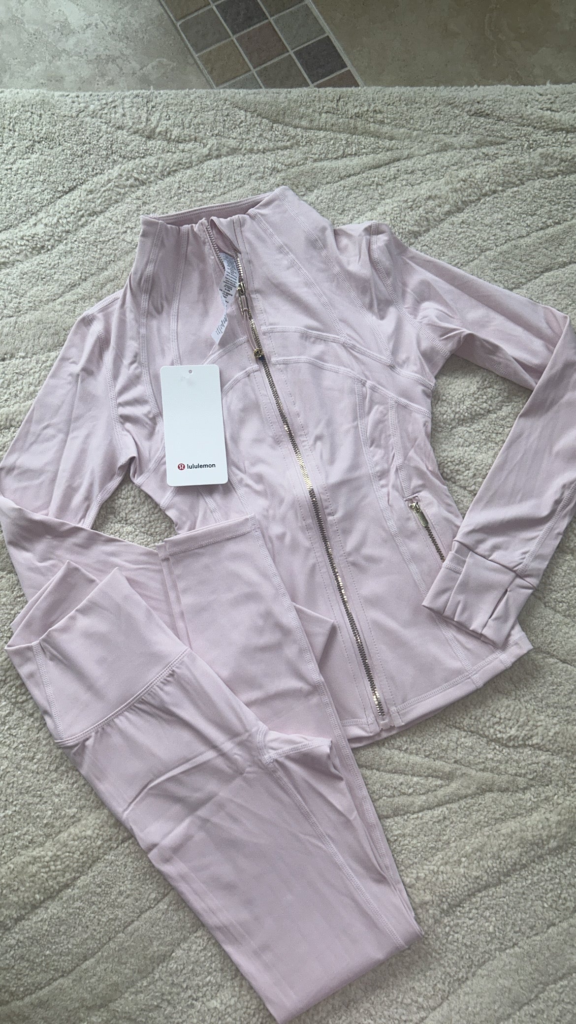Baby pink and gold zip