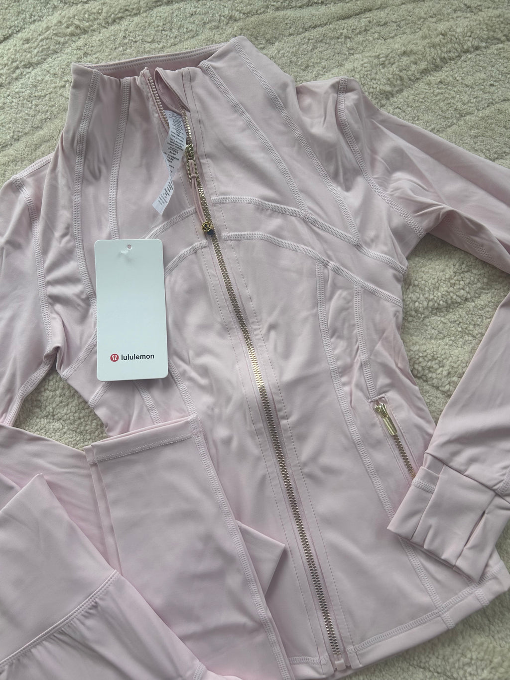 Baby pink and gold zip