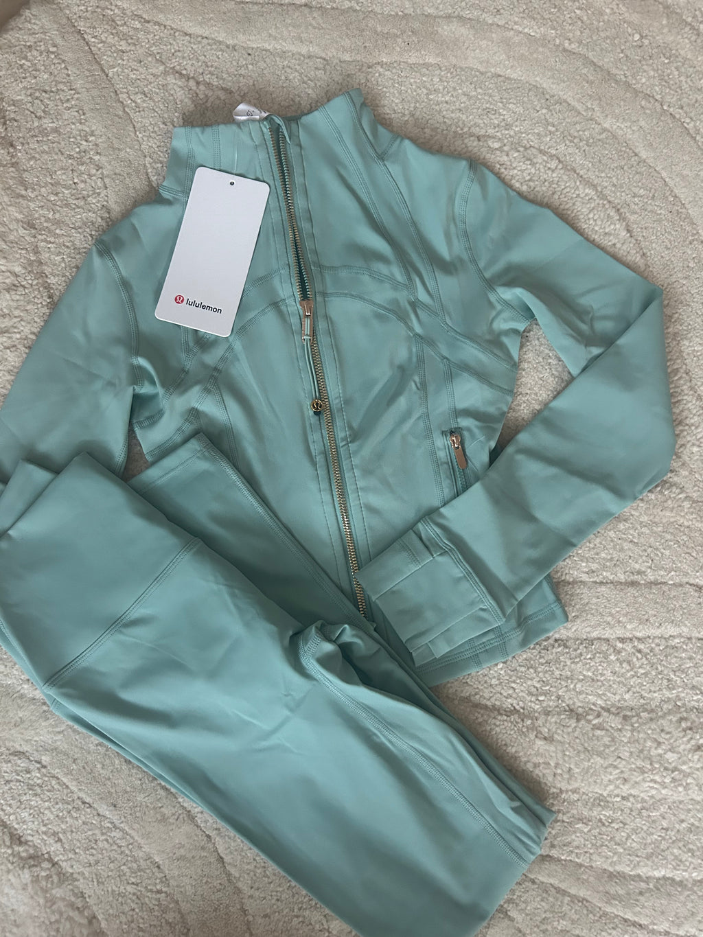 Mint and gold cropped define jacket