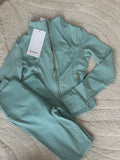 Mint and gold cropped define jacket