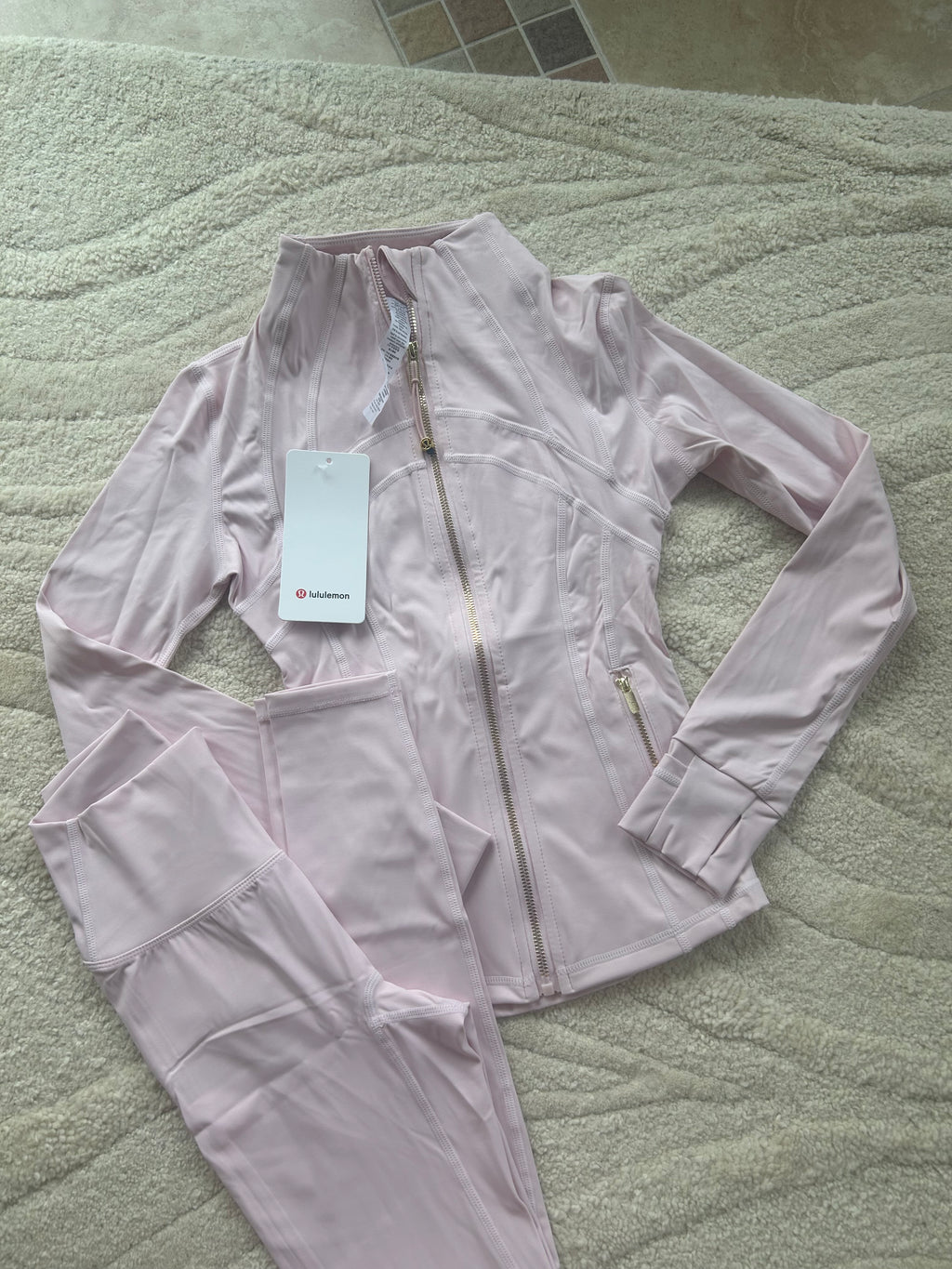 Baby pink and gold zip